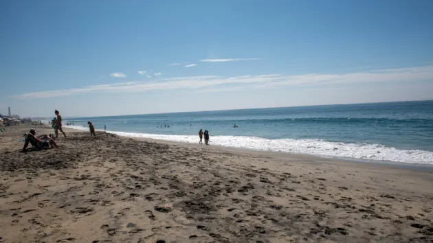Swimmers and Sunbathers at Carlsbad City Beach
