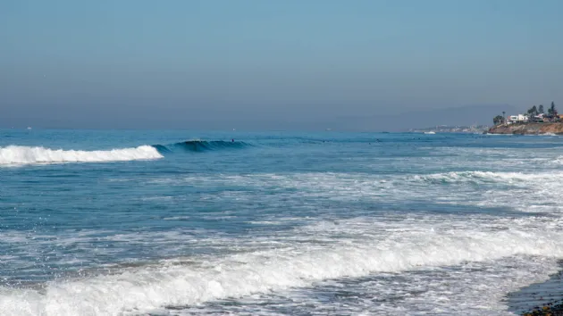 Surfers Waiting for the Perfect Wave at North Ponto Beach