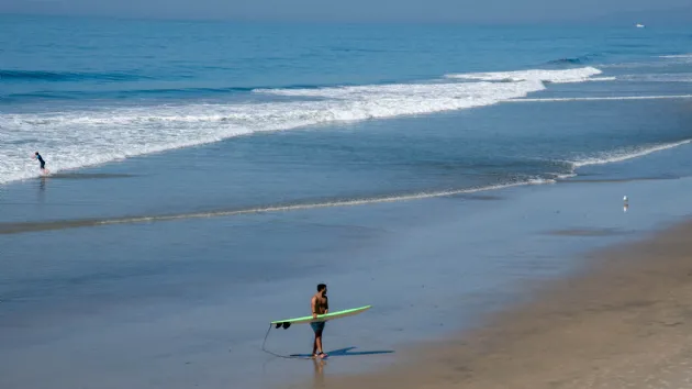 Coming in After a Surf at Stone Steps Beach