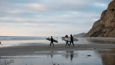 Surfers Going Out for a Surf at Blacks Beach