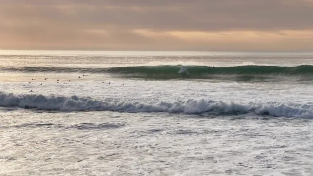 Surfer on An Over Head Wave at Windansea