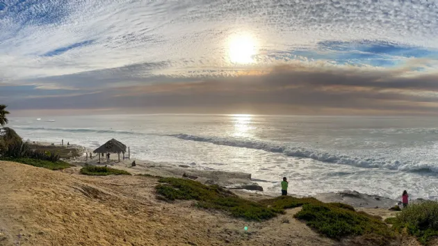 Surfers Waiting for the Perfect Wave next to the Surf Shack at Windansea