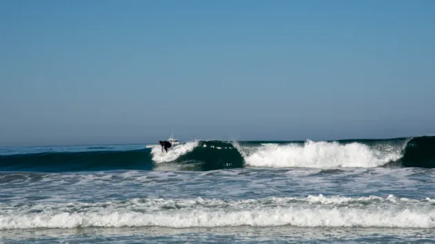 Surfer Catching a Wave Series 2 of 3 at Cherry Hill Seascape Beach
