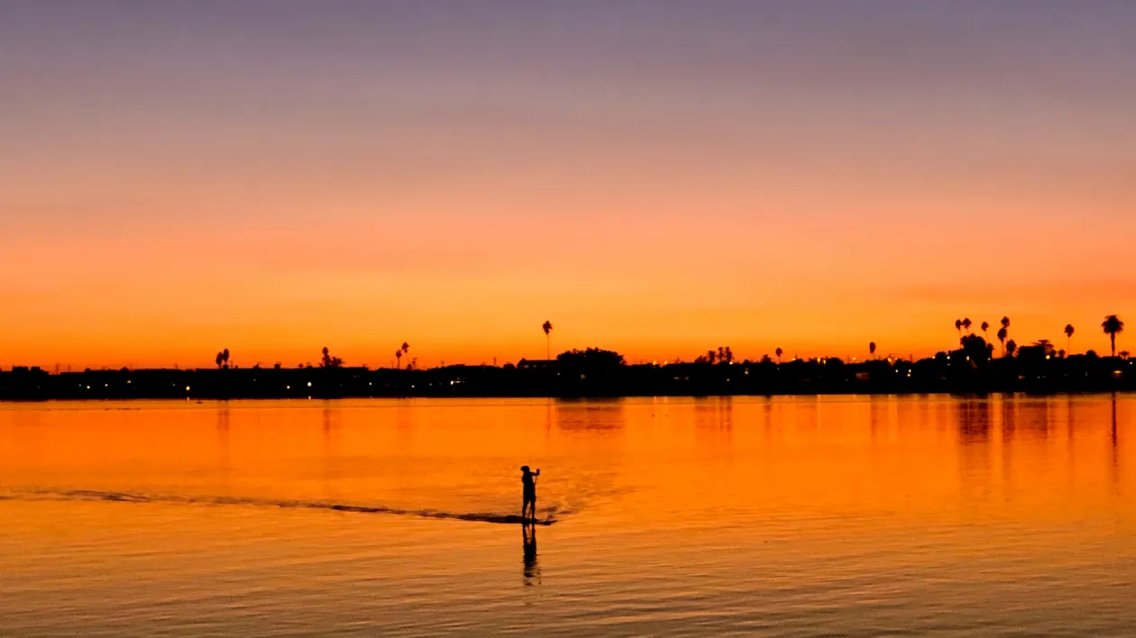 Paddle Boarding on Sail Bay at Sunset