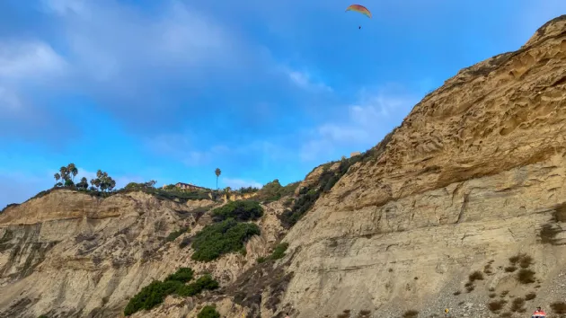 Paraglider Flying South of the Torrey Pines Gliderport