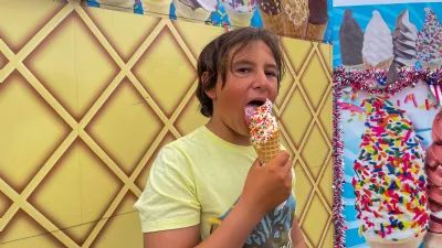 Kid Eating An Ice Cream Cone at the San Diego County Fair