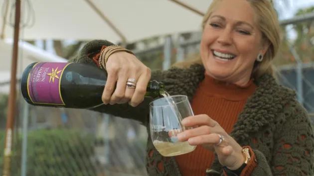 Happy While Pouring Wine at the Uncorked San Diego Wine Festival